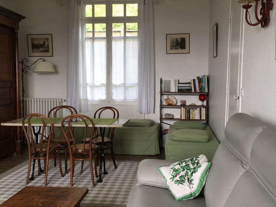Library, Living room, Seating area, Dining area