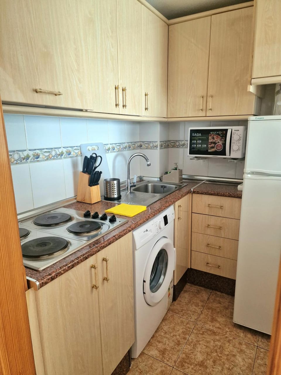 Kitchen or kitchenette, stove