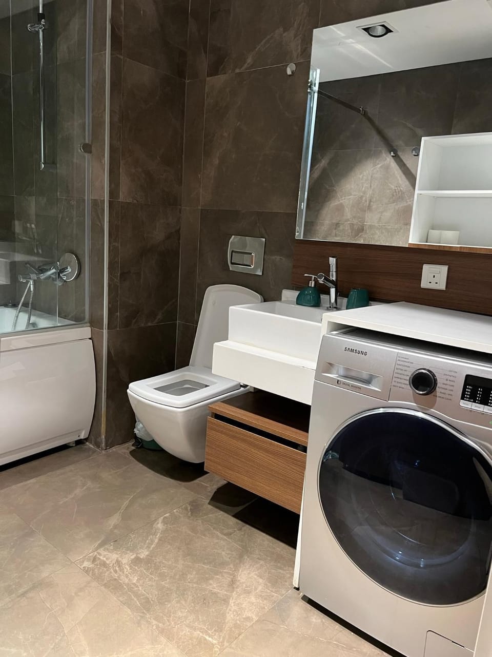 Shower, Toilet, Bathroom, towels, washing machine, dryer