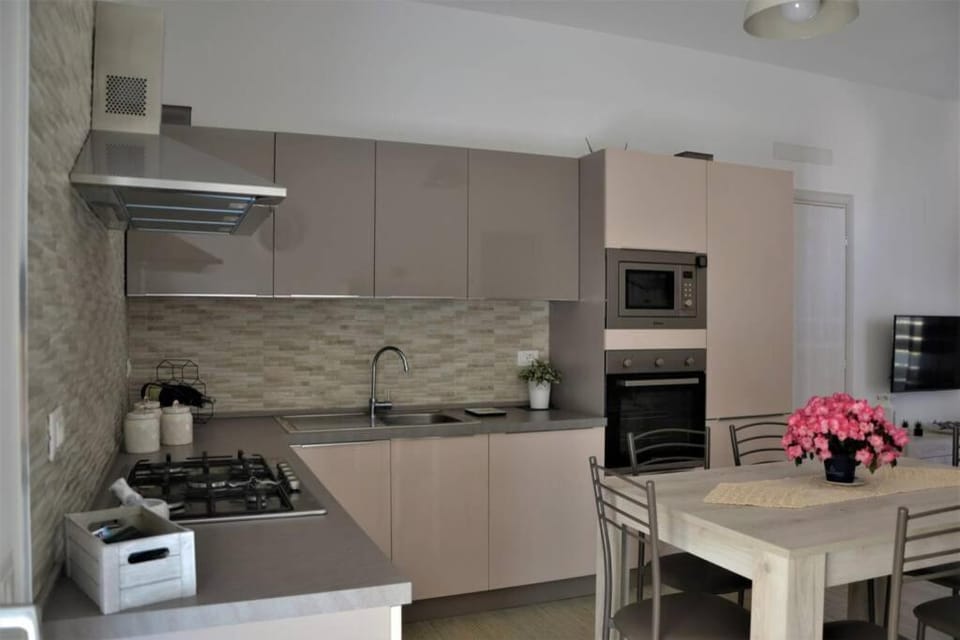 Dining area, dishwasher, oven, stove, toaster