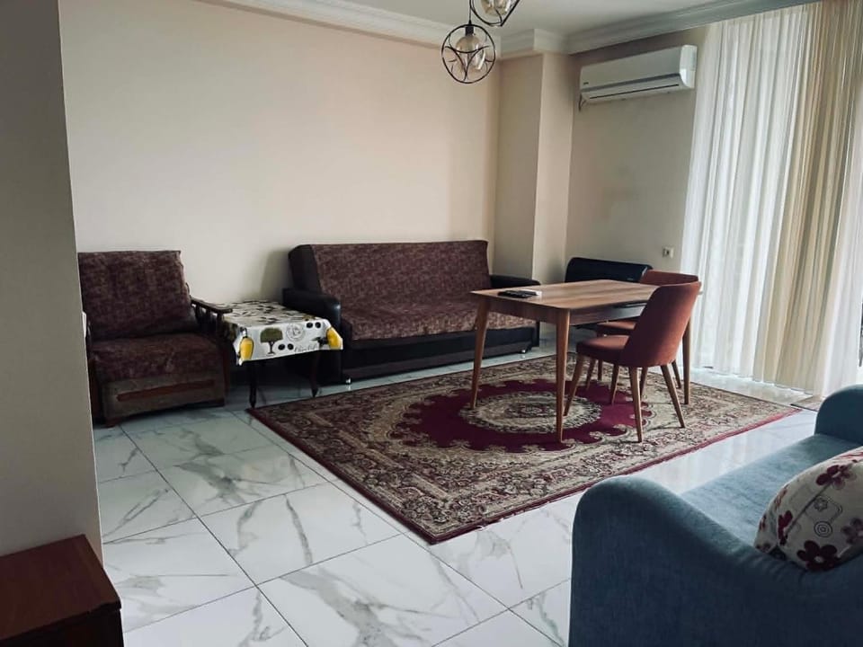 TV and multimedia, Living room, Seating area, furniture, air conditioner