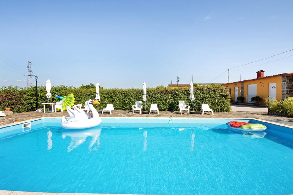 Property building, Living room, Swimming pool