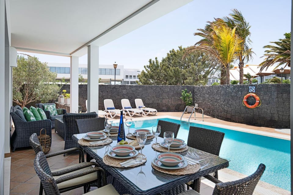 Property building, Living room, Swimming pool