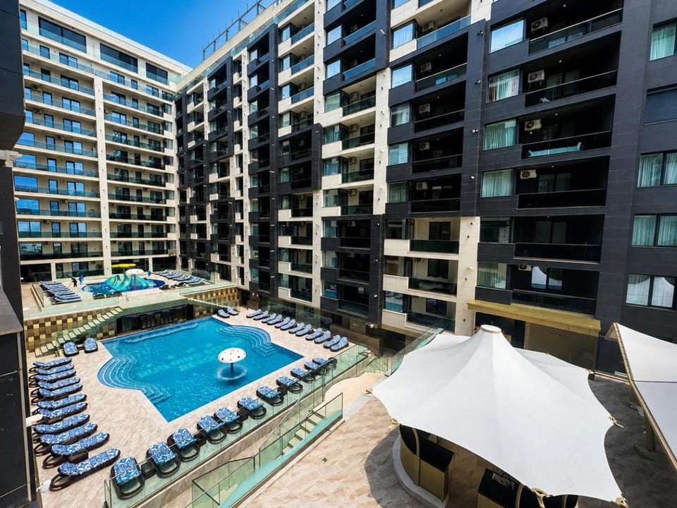 Property building, Day, View (from property/room), Pool view, Swimming pool, sunbed
