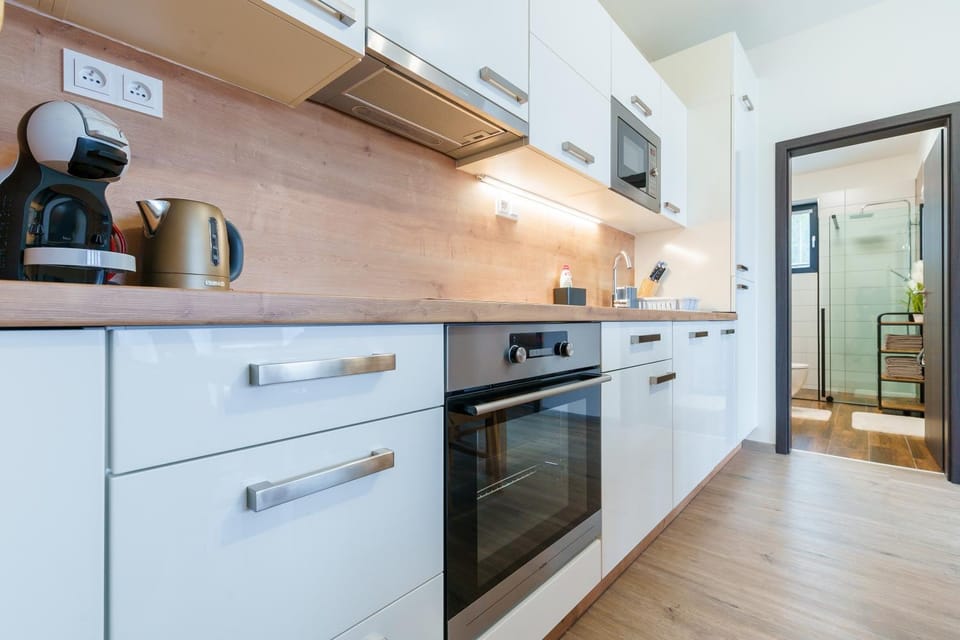 Kitchen or kitchenette, oven, stove