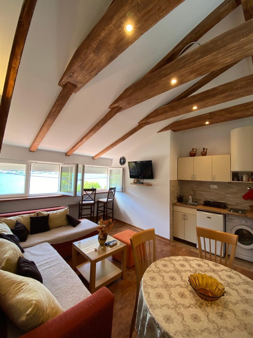 Kitchen or kitchenette, Living room, Seating area, Dining area, Sea view