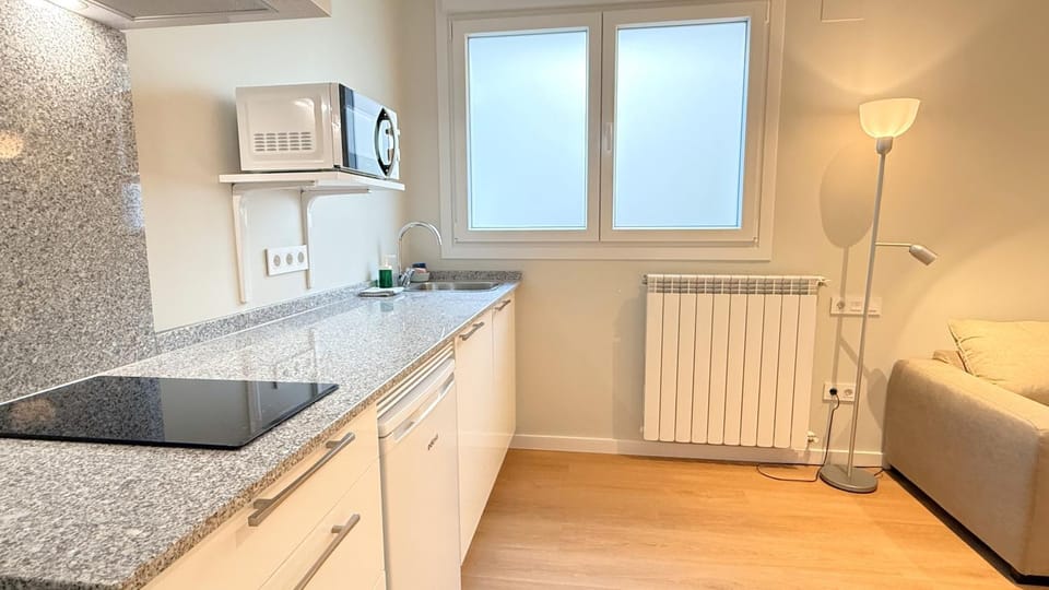 Kitchen or kitchenette, stove