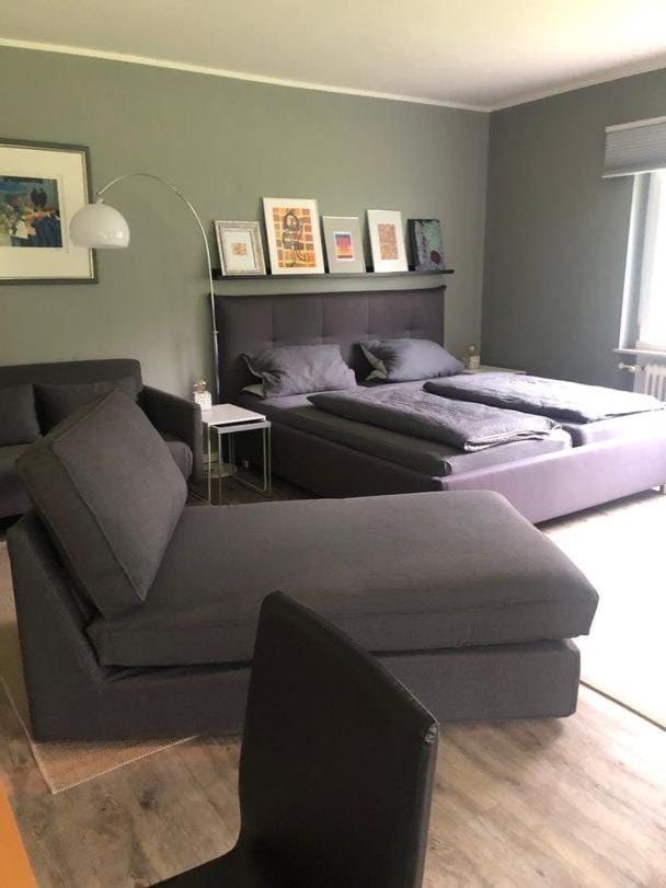 Bed, Living room, Seating area, Bedroom