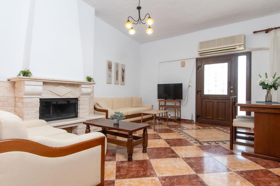 TV and multimedia, Living room, Seating area, air conditioner