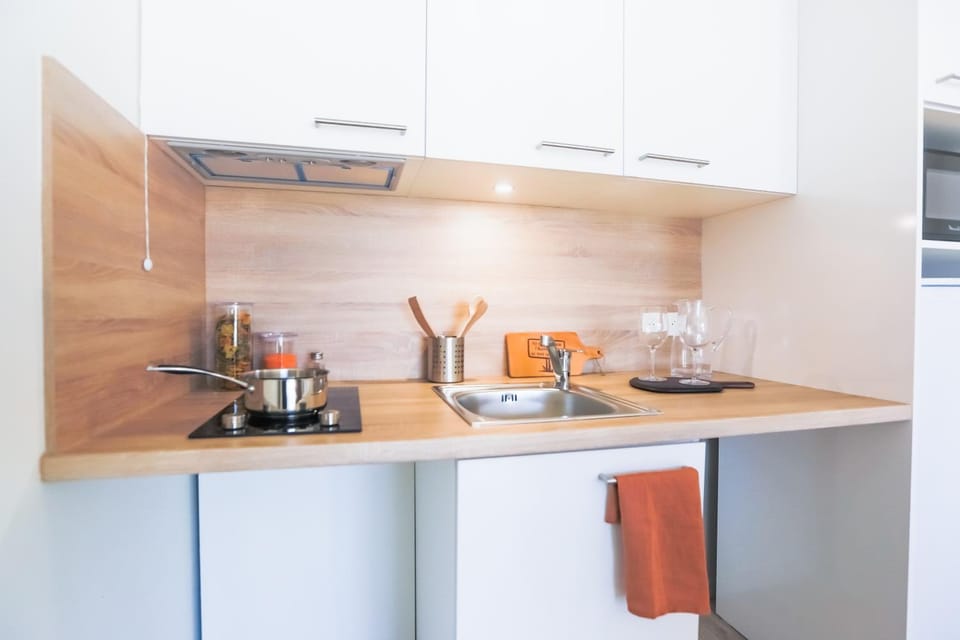 Kitchen or kitchenette, stove