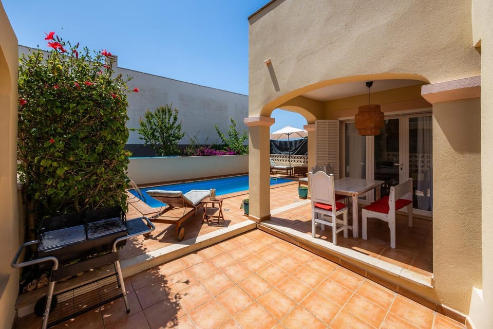 Property building, Living room, Swimming pool