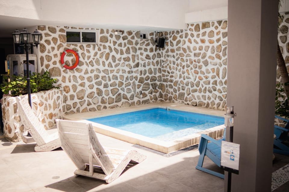 Swimming pool, sunbed