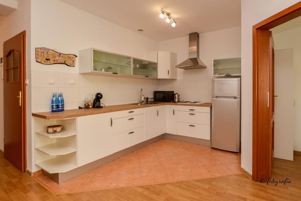Kitchen or kitchenette, oven, stove