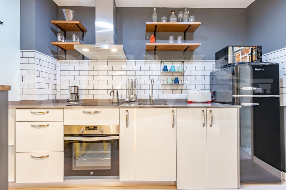 Kitchen or kitchenette, oven, stove, toaster