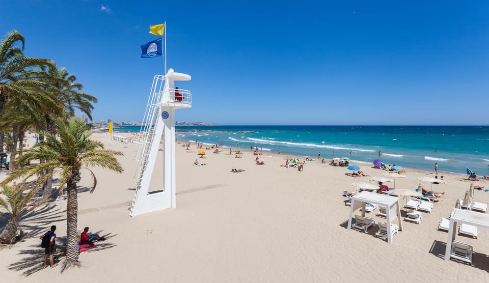 Nearby landmark, Day, People, Natural landscape, Beach, group of guests, sunbed