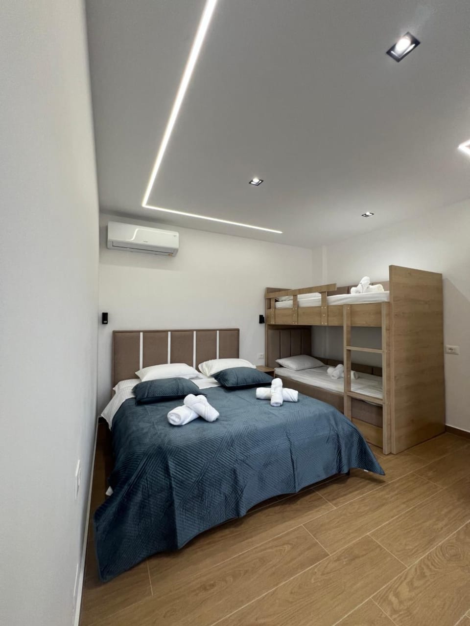 Bed, Photo of the whole room, Bedroom, bunk bed, towels, wardrobe, air conditioner