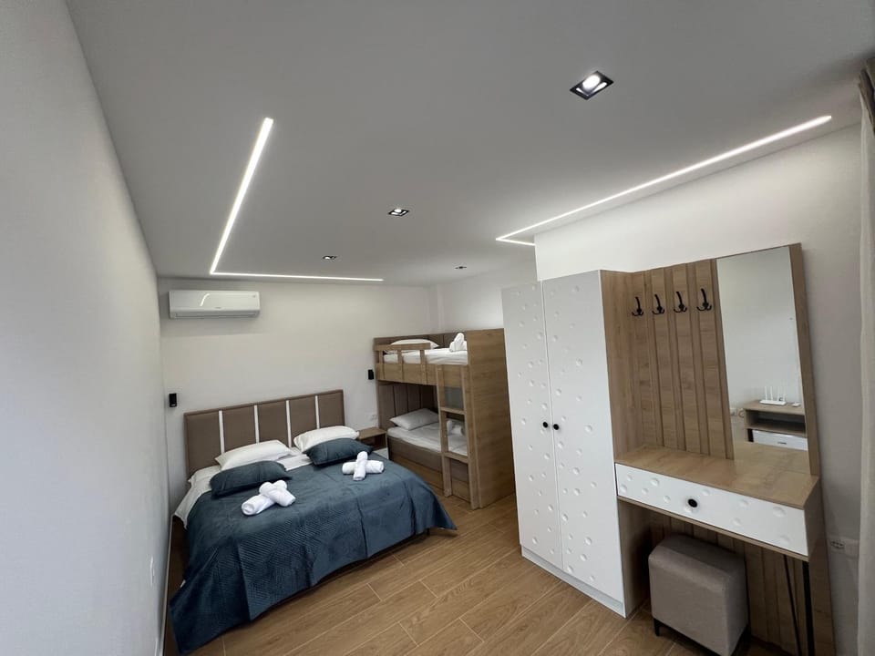 Bed, Photo of the whole room, Bedroom, bunk bed, towels, wardrobe, air conditioner