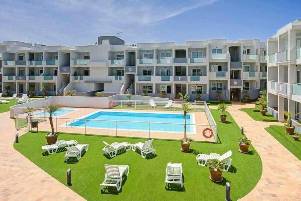 Surfer's view Pool AC WIFI DeskTerrace and Parking Apartment in Corralejo