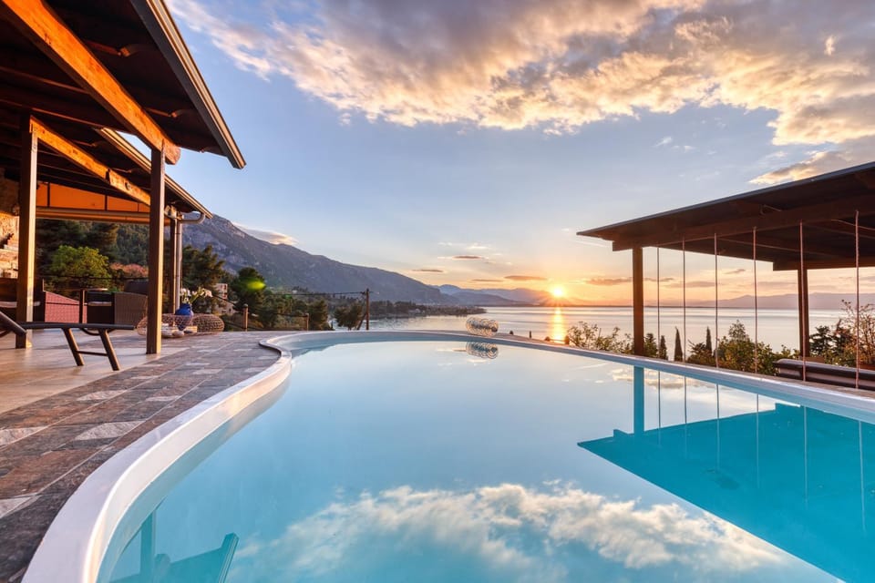 Patio, Nearby landmark, Day, Natural landscape, Balcony/Terrace, Lake view, Mountain view, Pool view, Swimming pool, Swimming pool, Sunrise, Sunset, sunbed