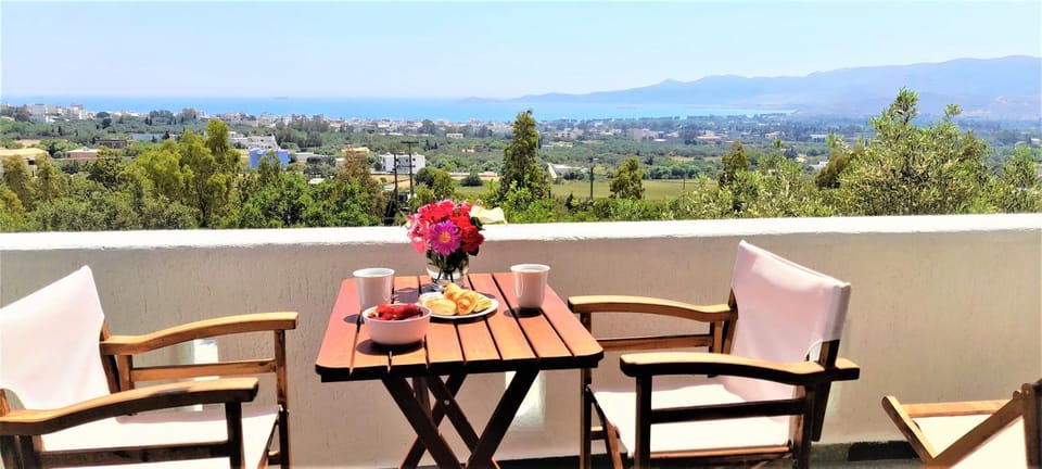 Property building, Patio, Day, Natural landscape, View (from property/room), Balcony/Terrace, Dining area, Mountain view, Sea view
