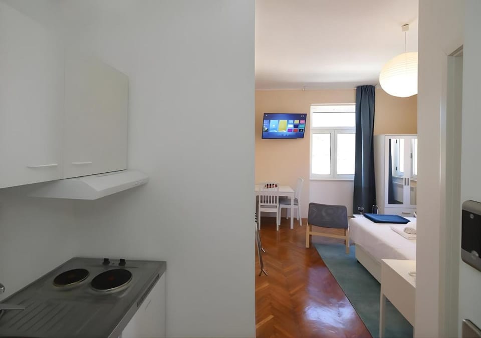Kitchen or kitchenette, stove