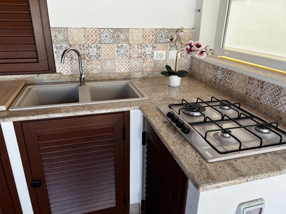 Kitchen or kitchenette, stove