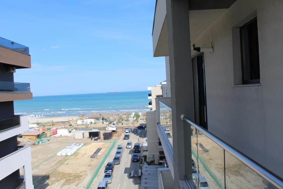 Property building, Day, Natural landscape, View (from property/room), Balcony/Terrace, Beach, Evening entertainment, City view, Sea view, Street view, Location, Parking
