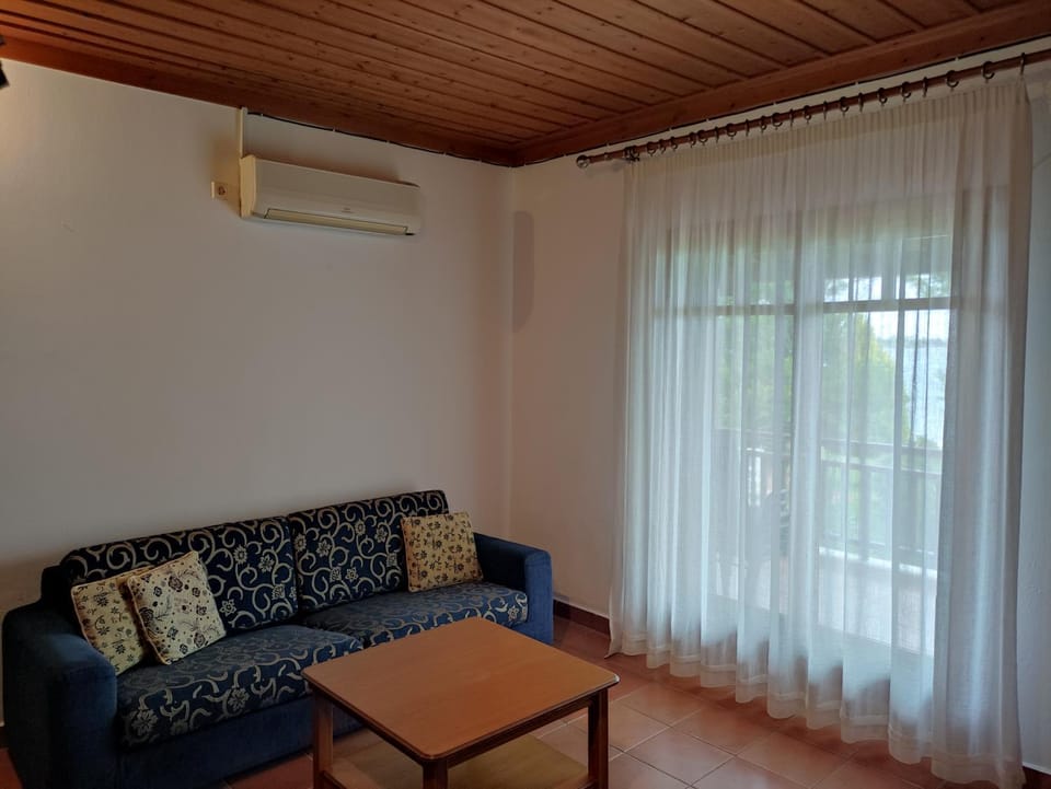 Bright, Beachfront Apartment with free parking and garden House in Halkidiki