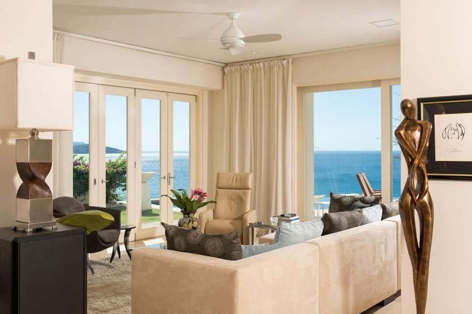 Exquisite Hilltop Villa with Luxurious Modern Design, Sweeping Ocean Views & Sparkling Infinity Pool House in Playa Flamingo