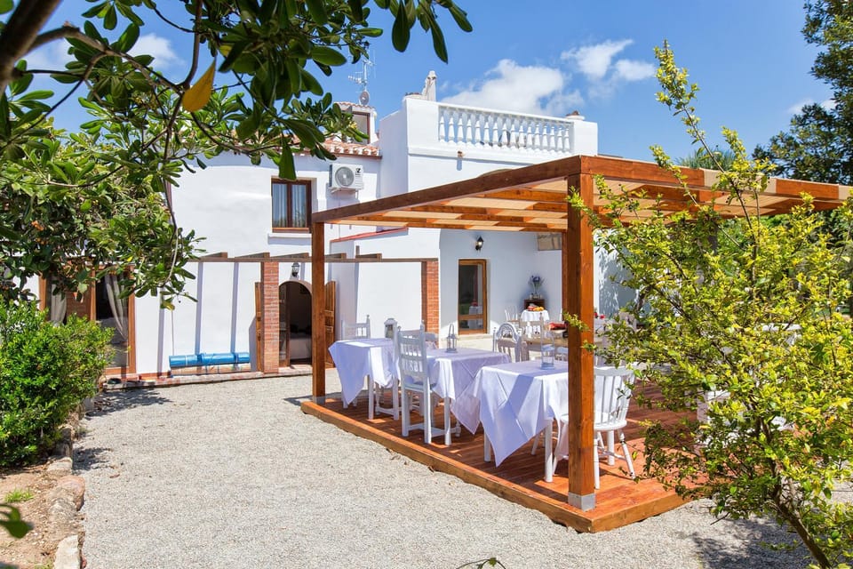 Property building, Patio, Dining area, Garden view