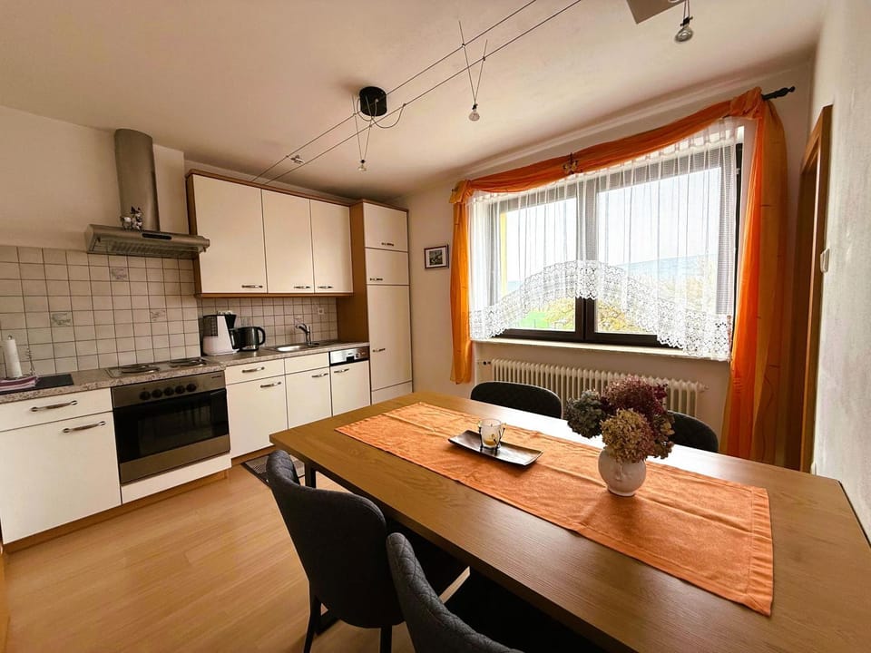 Seating area, dishwasher, stove, kitchen