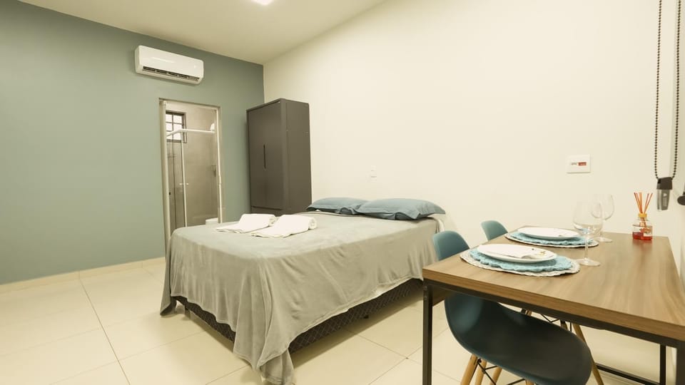 Bed, Photo of the whole room, Dining area, Bedroom, towels, wardrobe, air conditioner
