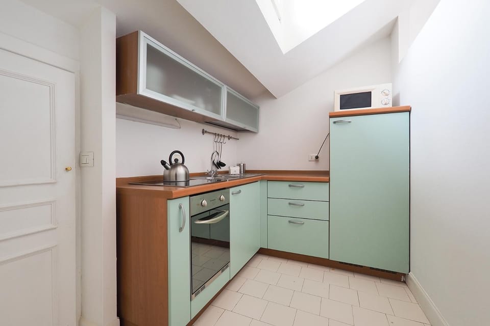 Kitchen or kitchenette, oven, stove