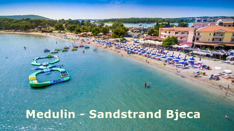 Day, Natural landscape, Bird's eye view, Beach, Text overlay, Sea view, sunbed