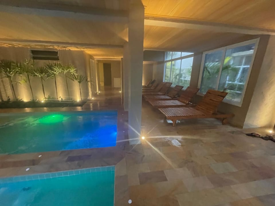 Jardim das Palmeiras II Home Resort - Imperdível - Vista Piscina - Suíte - Ubatuba Apartment in Ubatuba