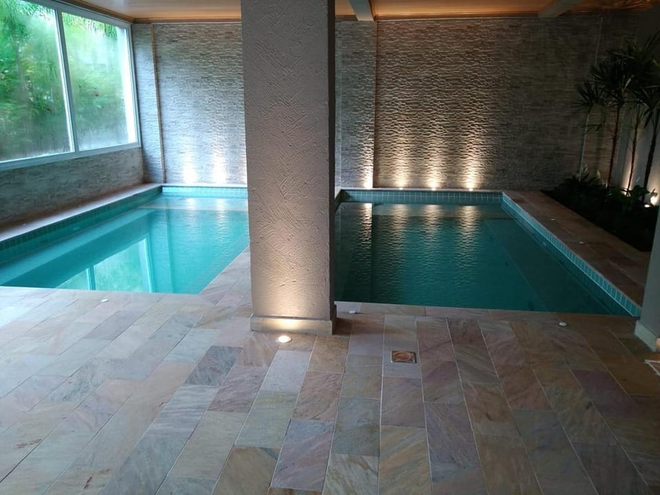 Jardim das Palmeiras II Home Resort - Imperdível - Vista Piscina - Suíte - Ubatuba Apartment in Ubatuba