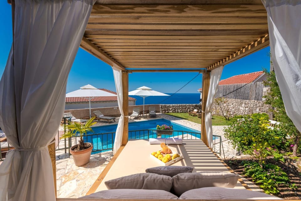 Property building, Patio, Day, Natural landscape, View (from property/room), Balcony/Terrace, Mountain view, Pool view, Swimming pool, sunbed