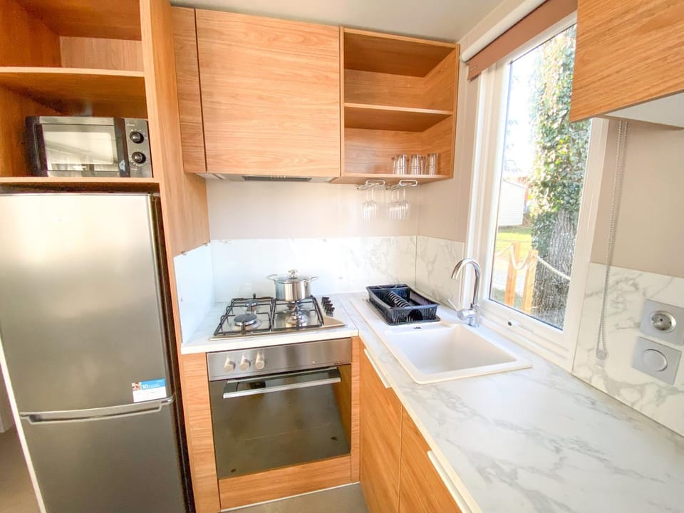 Kitchen or kitchenette, stove