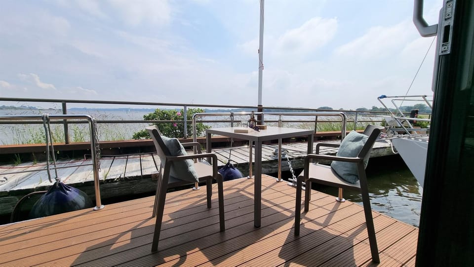 Natural landscape, View (from property/room), View (from property/room), Balcony/Terrace, Seating area, Lake view, Lake view, Landmark view, Landmark view, River view, Sea view