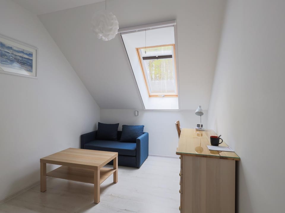 Property building, air conditioner, air conditioner
