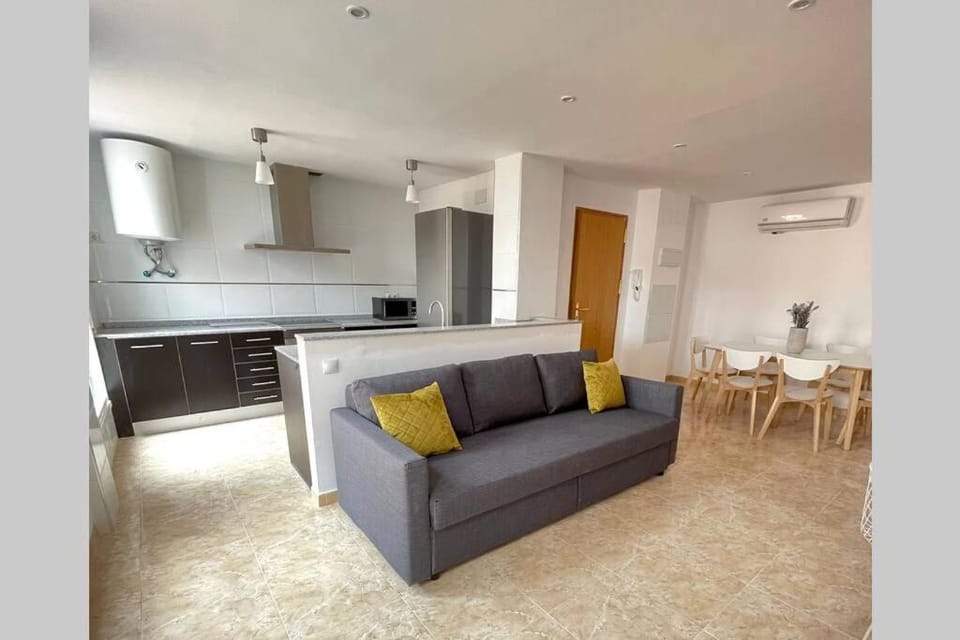 Kitchen or kitchenette, Living room, Seating area, Dining area, stove, air conditioner