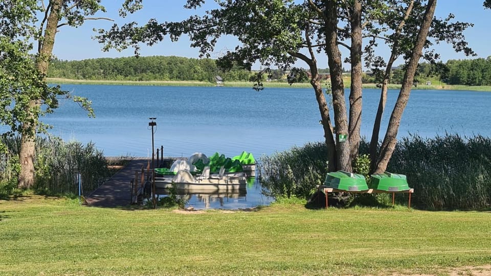 Siedlisko nr 4A nad jeziorem Skarlińskim, jezioro, mazury, domki letniskowe House in Masovian Voivodeship