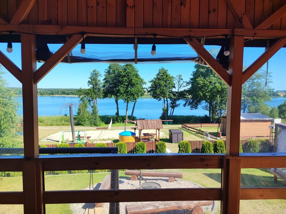 Siedlisko nr 4A nad jeziorem Skarlińskim, jezioro, mazury, domki letniskowe House in Masovian Voivodeship