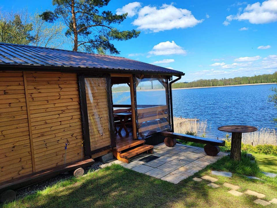 Siedlisko nr 2 nad jeziorem Skarlińskim, jezioro, mazury, domki letniskowe House in Poland