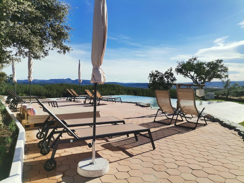 Natural landscape, View (from property/room), Swimming pool, sunbed