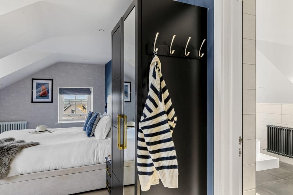 Bed, Bathroom, towels, wardrobe