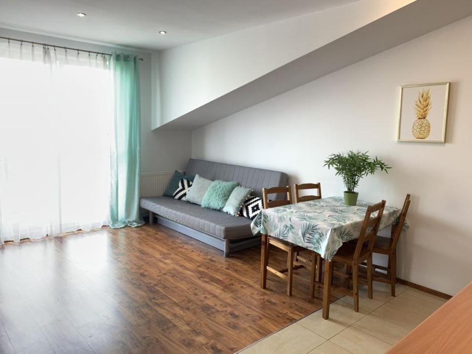 Bed, Living room, Seating area, Dining area