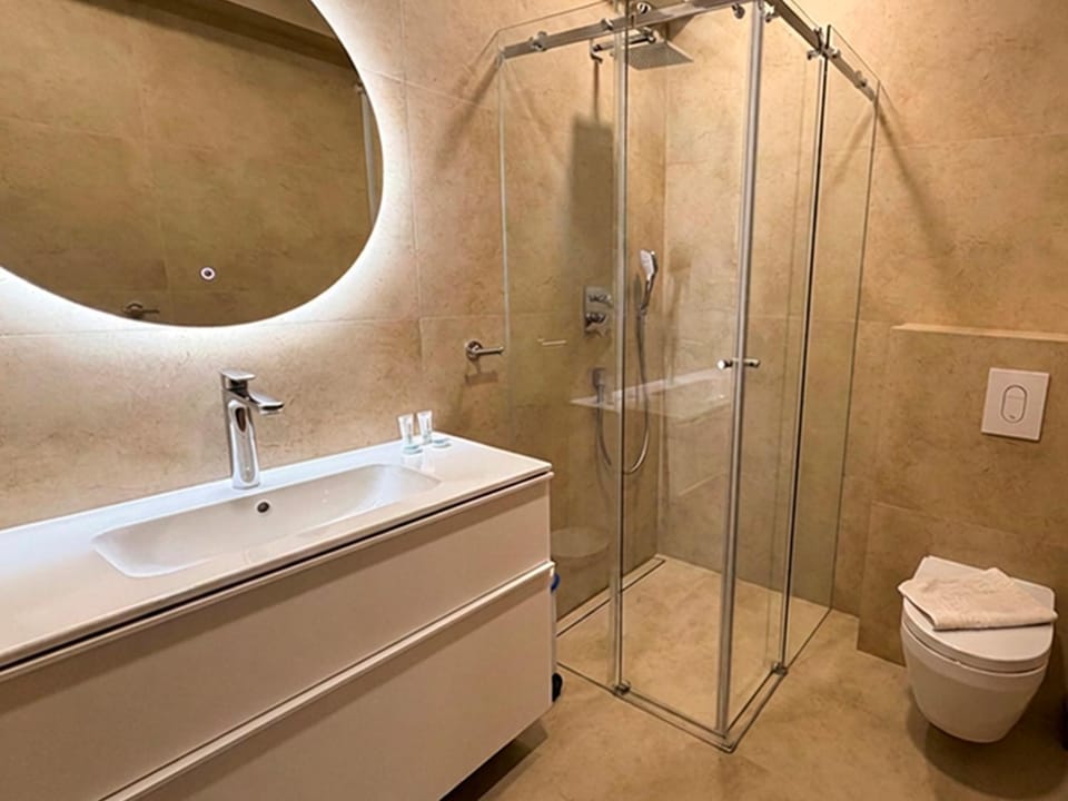 Shower, Bathroom, hair dryier, towels