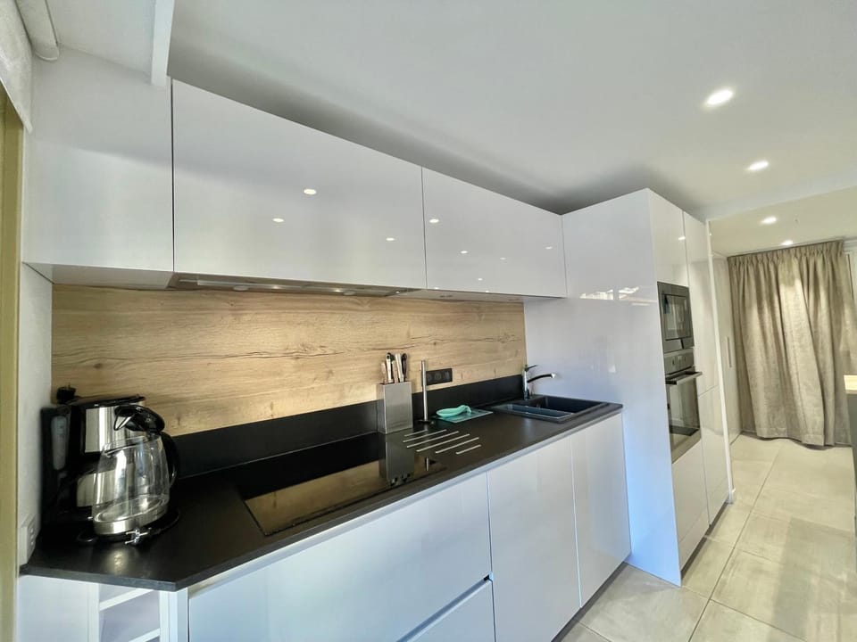 Kitchen or kitchenette, stove