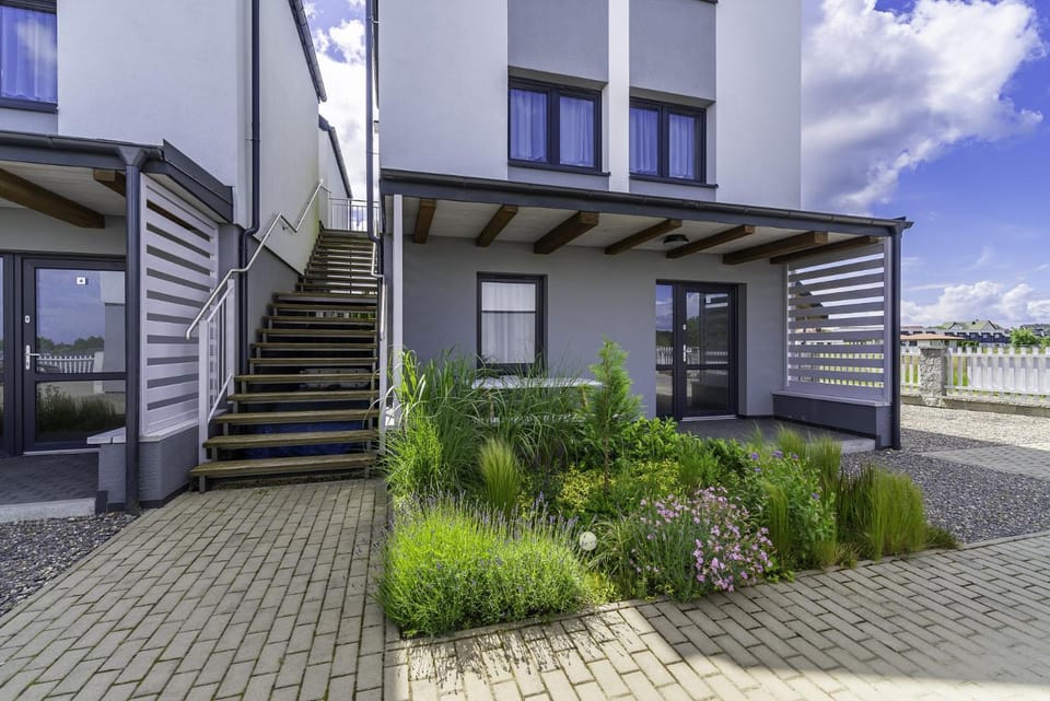 FRAJDA Domki - Apartamenty 6-osobowe - salon i dwie sypialnie oraz Studia 4-osobowe - pokój z aneksem kuchennym Apartment in West Pomeranian Voivodeship, Poland